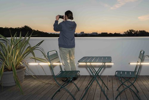 Photo of an afterwork event on a rooftop in Lyon.